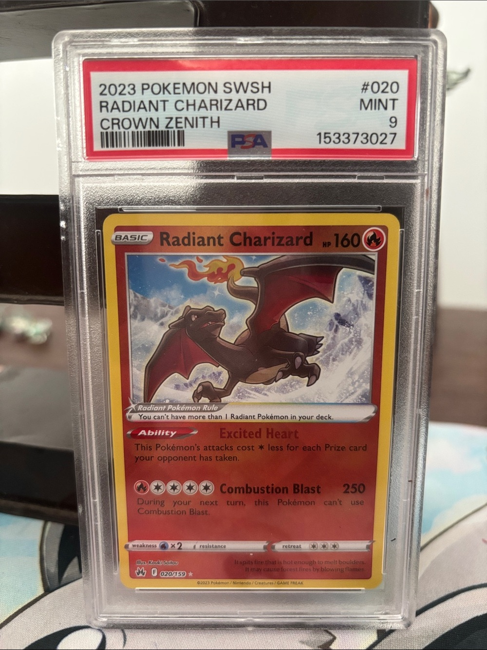 PSA Graded Radiant Charizard Card - Red/Yellow